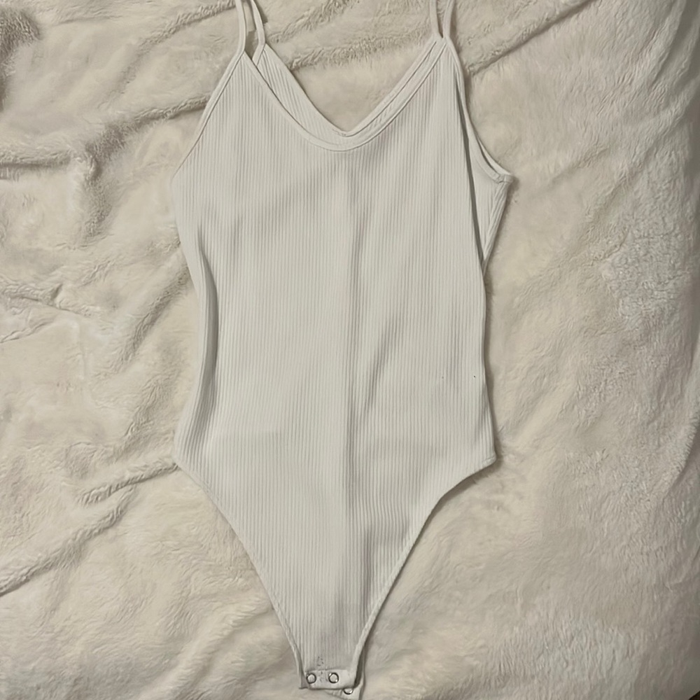 White tight bodysuit